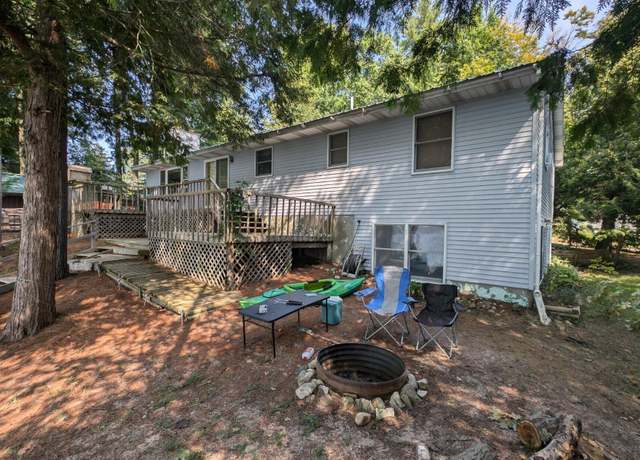 Property at 8901 W Isle Park Dr, Irons, MI 49644, 3 beds, 2 baths