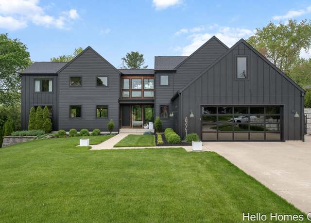 Property at 421 Manhattan Rd SE, East Grand Rapids, MI 49506, 4 beds, 3.5 baths