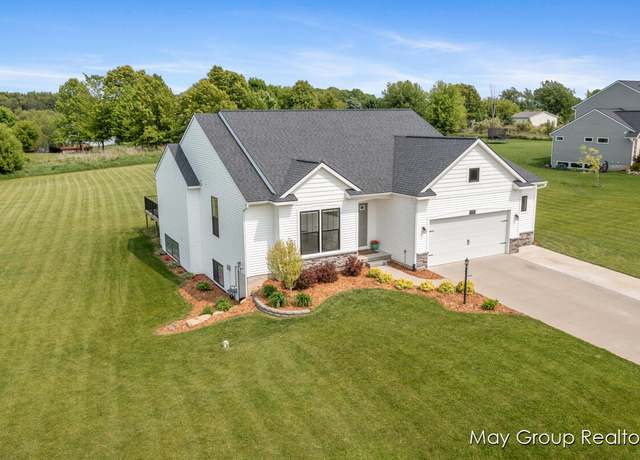 Property at 9198 Wabasis Pointe Dr NE, Greenville, MI 48838, 5 beds, 3 baths
