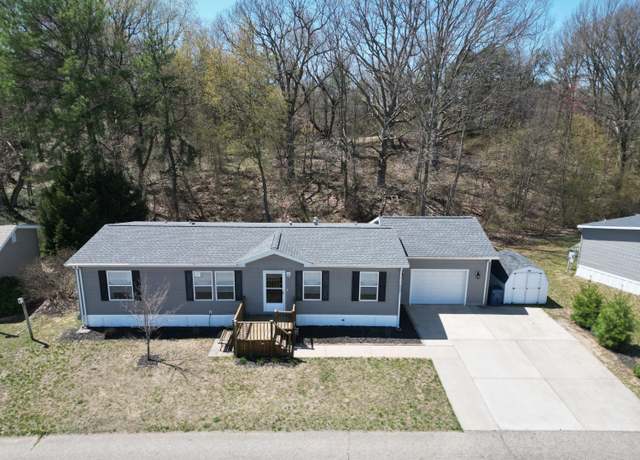 Property at 8687 Muirfield Dr, West Olive, MI 49460, 3 beds, 2 baths