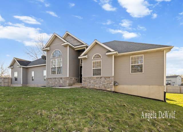 Property at 4087 Baldwin St, Hudsonville, MI 49426, 4 beds, 3 baths