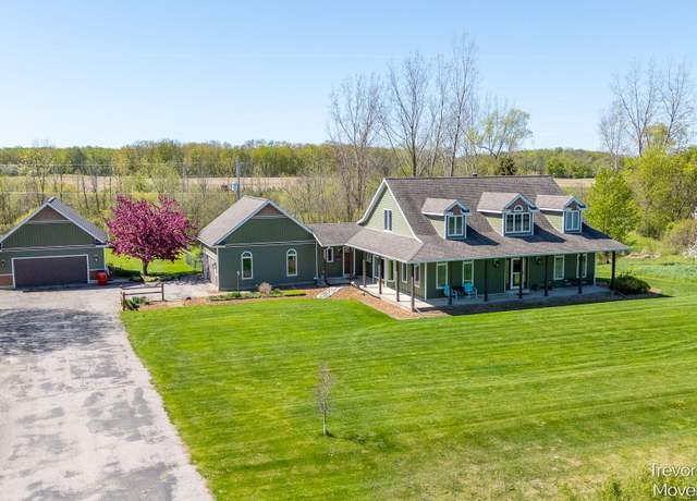Property at 242 Sherman Blvd, Kent City, MI 49330, 4 beds, 2.5 baths