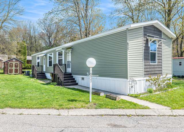 Property at 6922 Knotty Pine St NE, Rockford, MI 49341, 3 beds, 2 baths