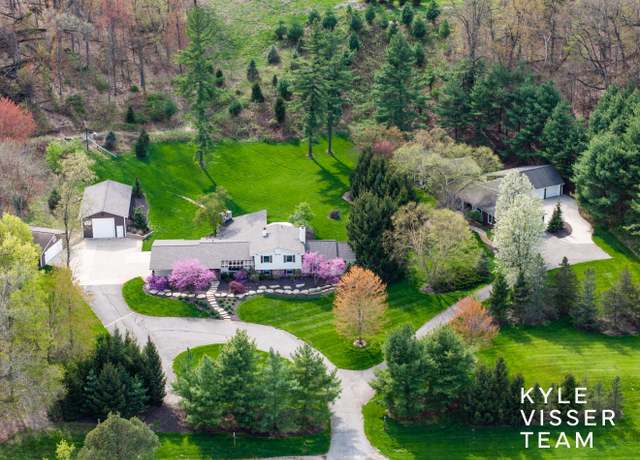 Property at 589 Grand River Dr NE, Ada, MI 49301, 4 beds, 4.5 baths