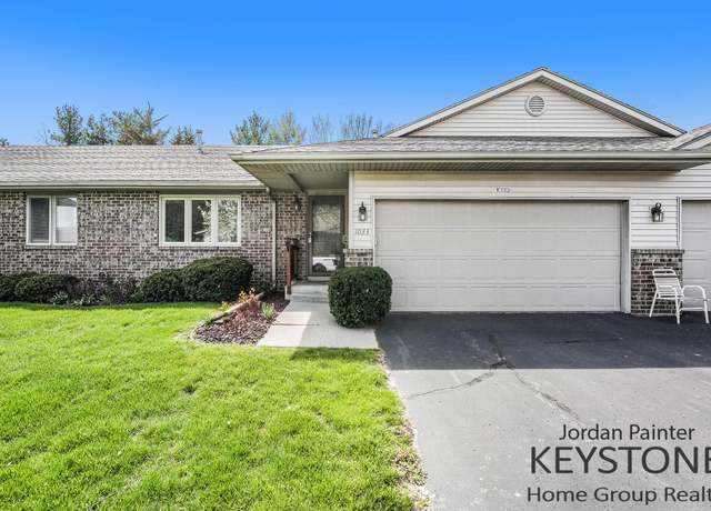 Property at 1033 Country Gdns NW, Grand Rapids, MI 49534, 3 beds, 2 baths