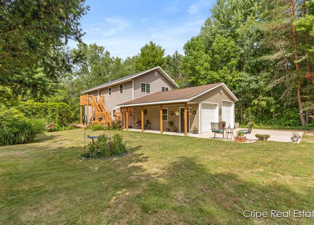 Property at 6037 16 Mile Rd NE, Cedar Springs, MI 49319, 4 beds, 2 baths