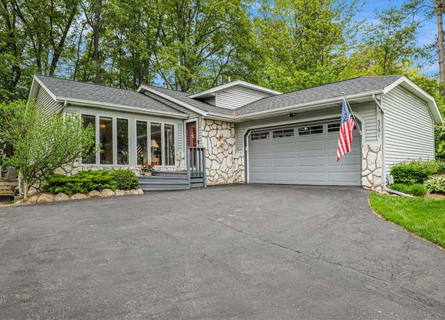 Property at 5751 Arroyo Vista Dr NE, Rockford, MI 49341, 4 beds, 3 baths