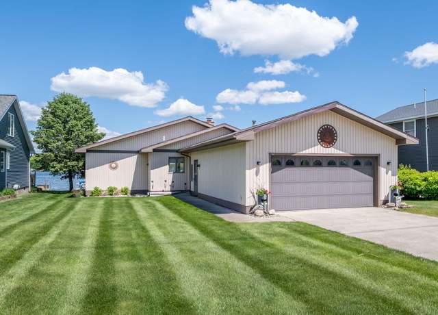 Property at 7360 Holiday Dr, Canadian Lakes, MI 49346, 4 beds, 2 baths