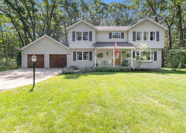 Property at 1425 Meadow Wood Dr, Manistee, MI 49660, 4 beds, 2.5 baths