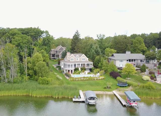 Property at 2634 Reeds Lake Ct SE, East Grand Rapids, MI 49506, 5 beds, 4.5 baths