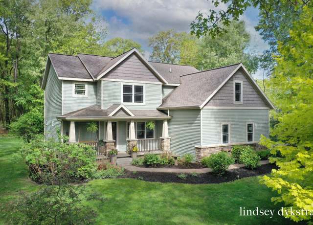 Property at 8501 Camelot Dr NE, Rockford, MI 49341, 5 beds, 3.5 baths