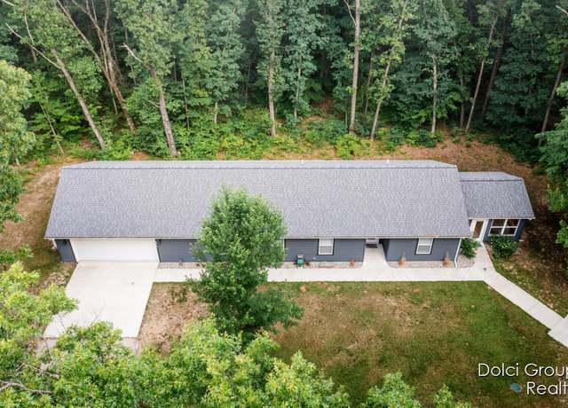 Property at 8919 Buckhorn Dr, Howard City, MI 49329, 4 beds, 2 baths
