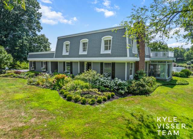 Property at 4090 Fulton St E, Grand Rapids, MI 49546, 4 beds, 2.5 baths