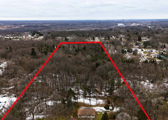 Property at 728 Buth Dr NE, Comstock Park, MI 49321, 4 beds, 2 baths