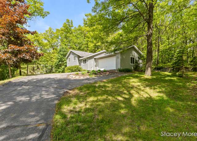 Property at 4701 Wood Valley Ct NE, Rockford, MI 49341, 3 beds, 2 baths