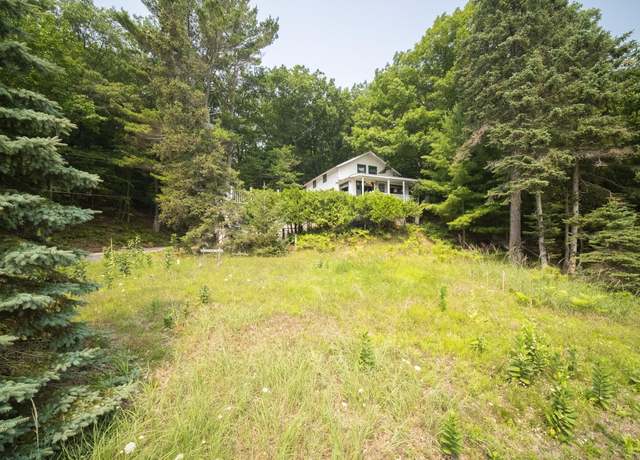 Property at 8368 Portage Point Dr, Onekama, MI 49675, 3 beds, 2.5 baths