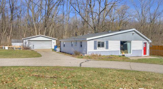 Photo of 313 6 Mile Rd NE, Comstock Park, MI 49321