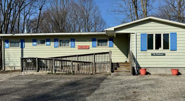 Photo of 8288 Portage St, Onekama, MI 49675