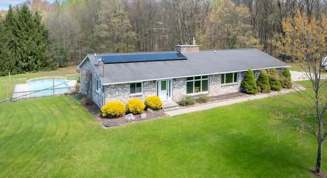 Photo of 1475 10 Mile Rd NE, Comstock Park, MI 49321