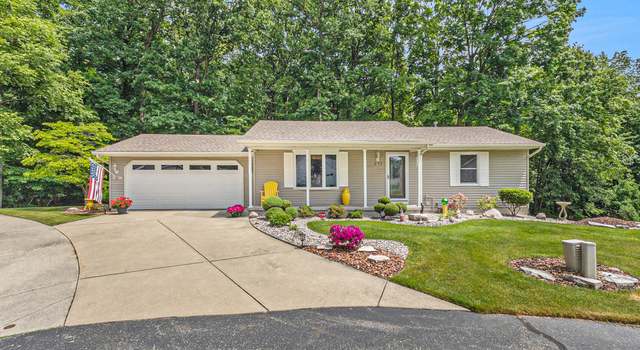 Photo of 272 Chasseral Ct NW, Comstock Park, MI 49321