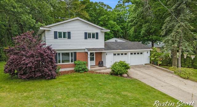 Photo of 310 Brookgate Ct NW, Comstock Park, MI 49321