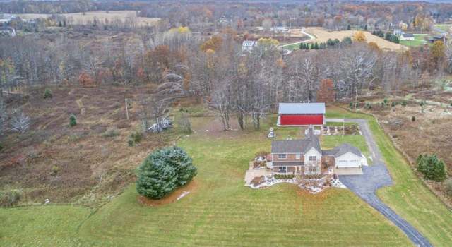 Photo of 4277 Mccabe Ave NE, Ada, MI 49301
