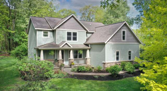 Photo of 8501 Camelot Dr NE, Rockford, MI 49341