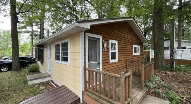 Photo of 232 Lake Dr, Six Lakes, MI 48886