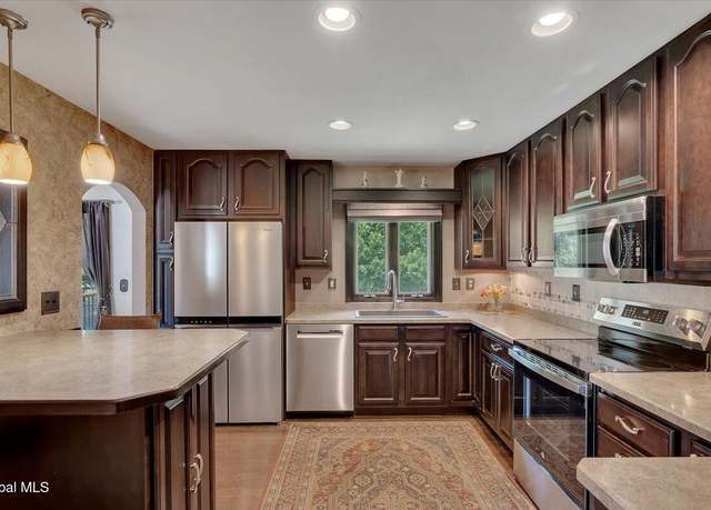 Property at 8 Marjorie Dr, Saratoga Springs, NY 12866, 4 beds, 4 baths