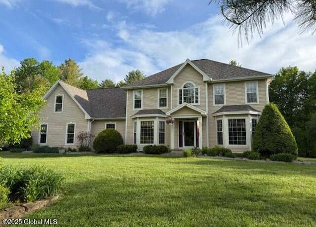 Property at 135 Boulderwood Dr, Queensbury, NY 12804, 4 beds, 3.5 baths