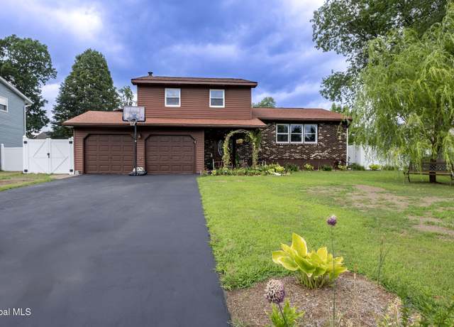 Property at 55 Alpine Dr, Latham, NY 12110, 3 beds, 3 baths