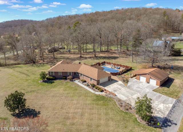 Property at 417 Raccoon Valley Rd, Powell, TN 37849, 4 beds, 3 baths