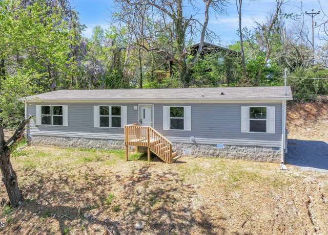 Property at 410 N Patton Ave, Rockwood, TN 37854, 4 beds, 2 baths