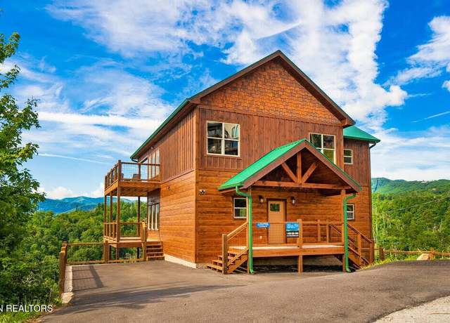 Property at 859 Sourwood Dr, Gatlinburg, TN 37738, 4 beds, 4 baths