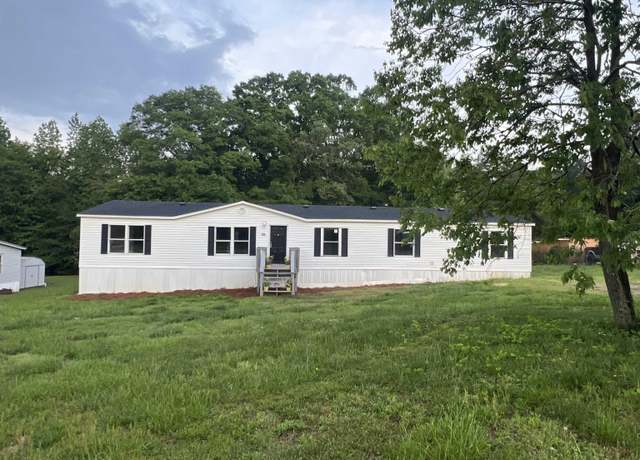 Property at 124 Golf Ln, Fountain Inn, SC 29644, 5 beds, 3 baths