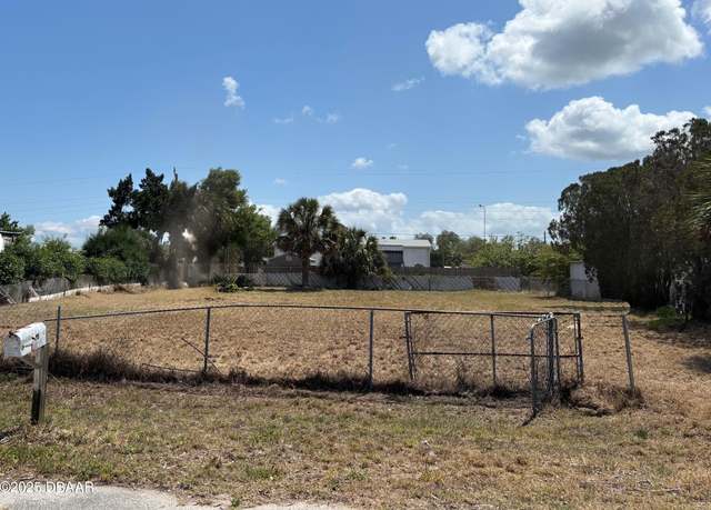 Property at 149 N 1st St, Oak Hill, FL 32759