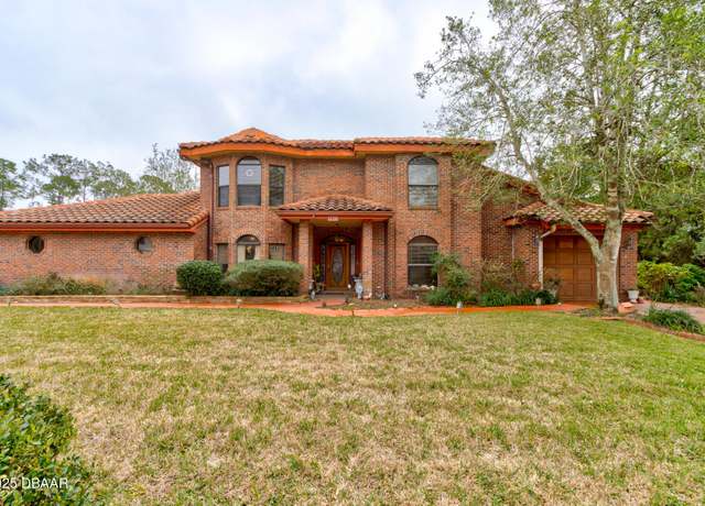 Property at 140 Westrobin Ln, Palm Coast, FL 32164, 4 beds, 4 baths
