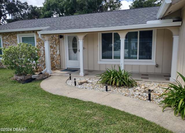 Property at 211 N Brighton Dr, Port Orange, FL 32127, 4 beds, 3 baths
