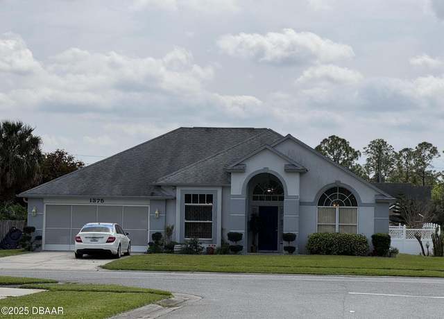 Property at 1375 S Wembley Cir, Port Orange, FL 32128, 4 beds, 2 baths