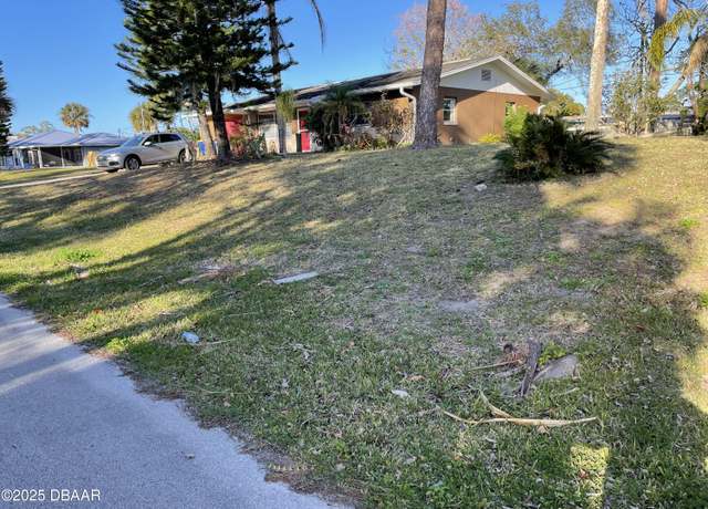 Property at 2719 Travelers Palm Dr, Edgewater, FL 32141, 3 beds, 2 baths