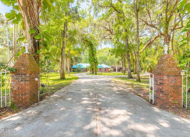 Property at 712 S Timberlane Dr, New Smyrna Beach, FL 32168, 4 beds, 3 baths