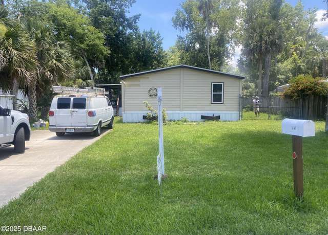 Property at 1047 Green Acres Cir N, Daytona Beach, FL 32119, 3 beds, 2 baths