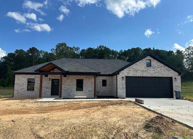 Property at 1128 Duke Dr, Bauxite, AR 72011, 4 beds, 2 baths