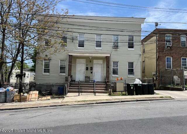 Property at 12 Castleton Ave, Staten Island, NY 10301, 12 beds, 4 baths