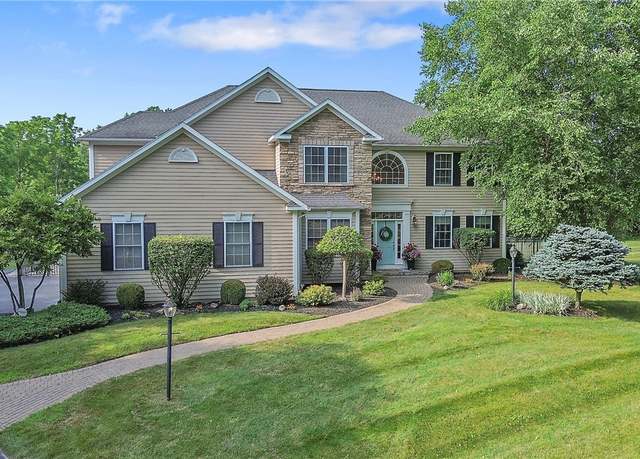 Property at 1002 Oreste St, Camillus, NY 13031, 4 beds, 2.5 baths