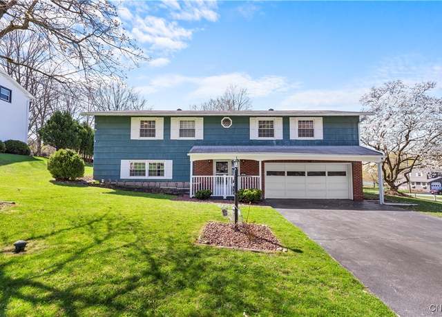 Property at 400 Oakridge Dr, Camillus, NY 13031, 4 beds, 3 baths