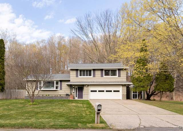 Property at 513 Oakridge Dr, Camillus, NY 13031, 5 beds, 3 baths