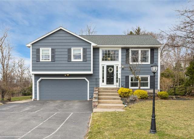 Property at 4 French Meadow Ln, Brighton, NY 14618, 4 beds, 1.5 baths