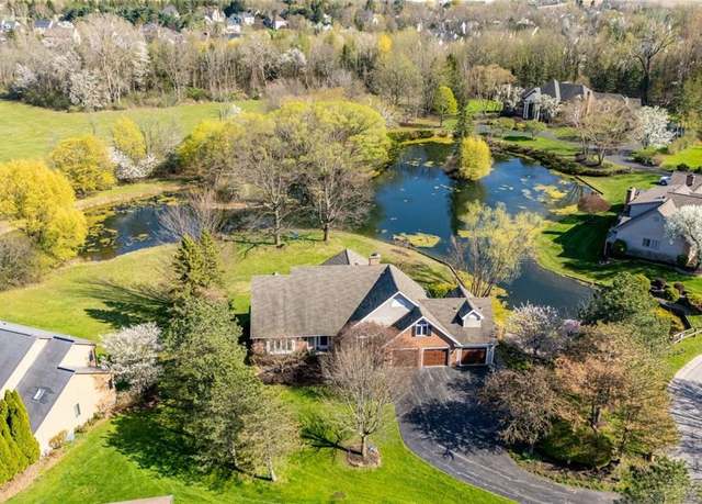Property at 8 Hidden Springs Dr, Pittsford, NY 14534, 4 beds, 2.5 baths