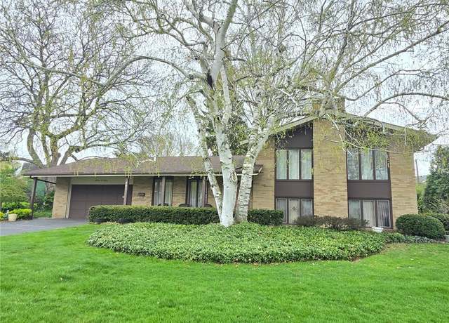 Property at 401 Eileen Dr, Greece, NY 14616, 4 beds, 2 baths